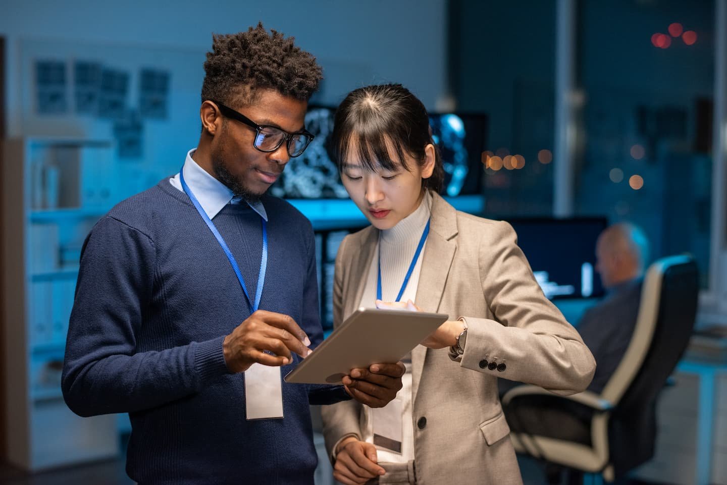 Two Young Interracial Colleagues Preparing Present for helloelementor
